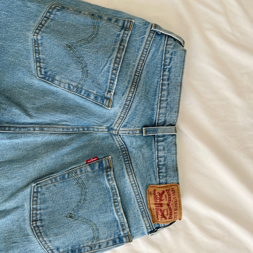 Levi 501 button fly light wash jeans